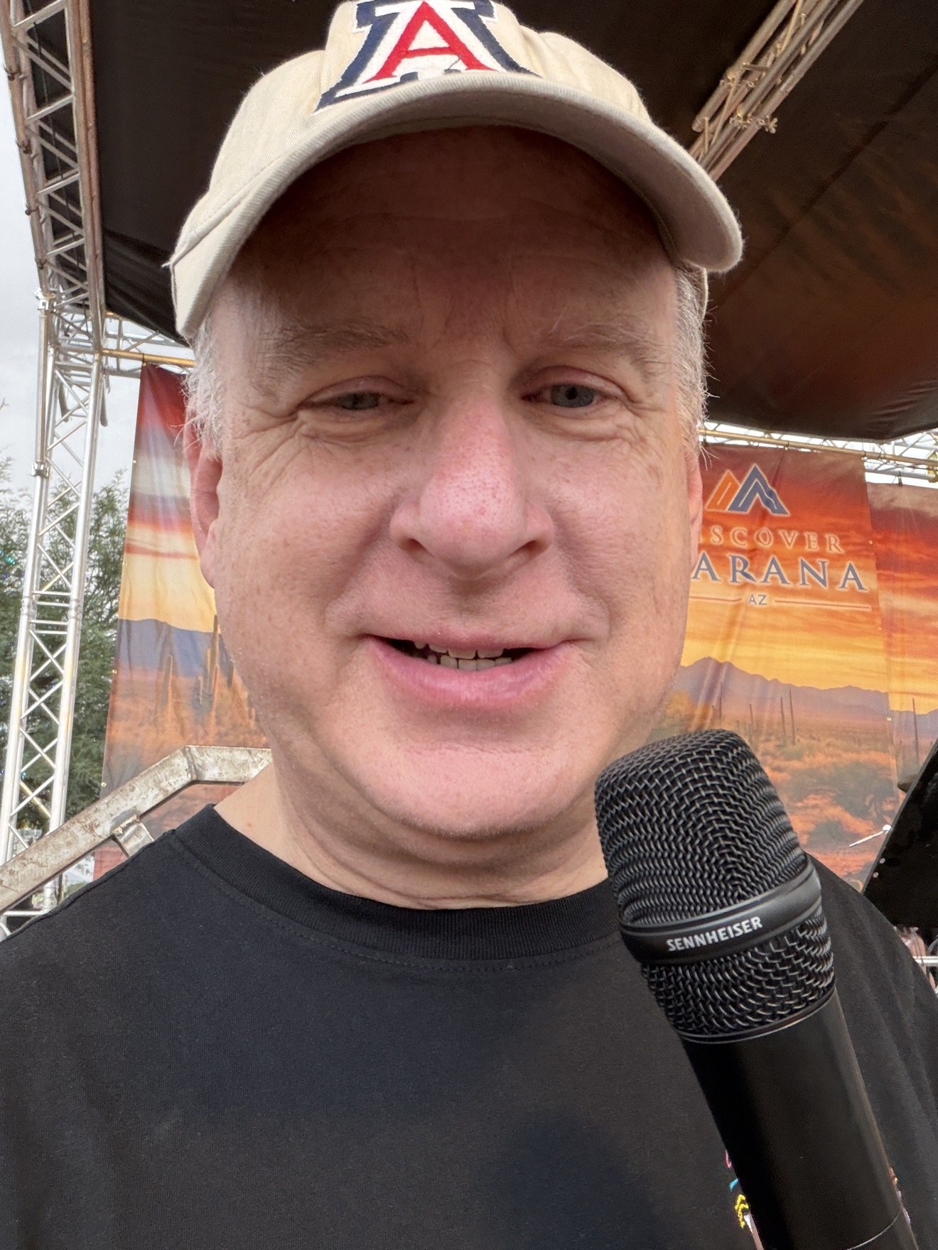 Buzz Jackson on stage hosting the Town of Marana Fall Festival